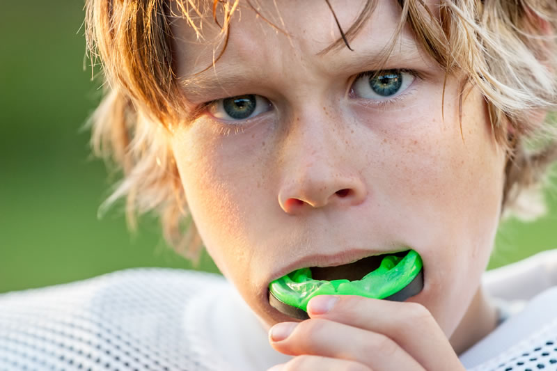 Mouth Guards - kid wearing mouth guard